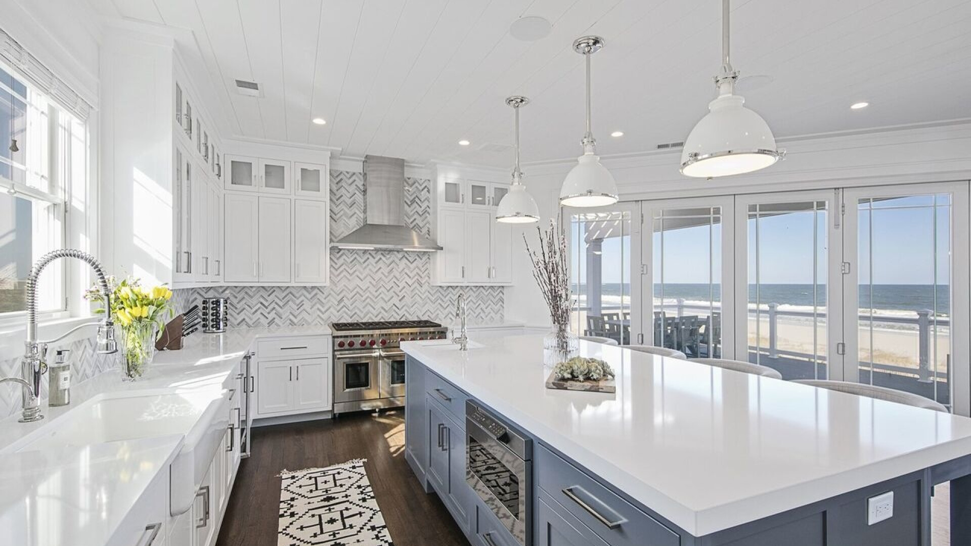 Light and bright custom-built kitchen that transitions seamlessly to the outdoor balcony, Long Beach Island NJ