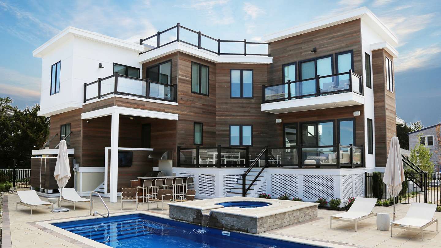 Luxurious modern beach home boasting private balconies, a pool, and a hot tub, Long Beach Island NJ